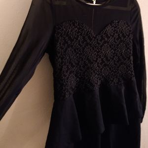 Sheer long sleeve fitted black cocktail dress